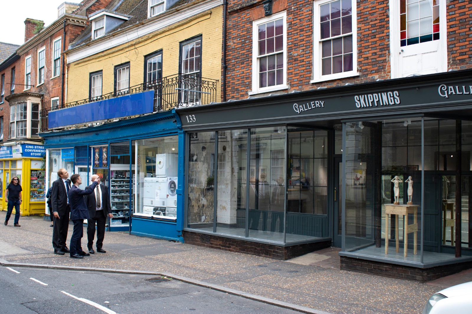 Carl Smith, David Glason and Matthew Mckeague outside the recently reopened Skippings Gallery, with housing uses above, all of which are now owned and operated by Great Yarmouth PT